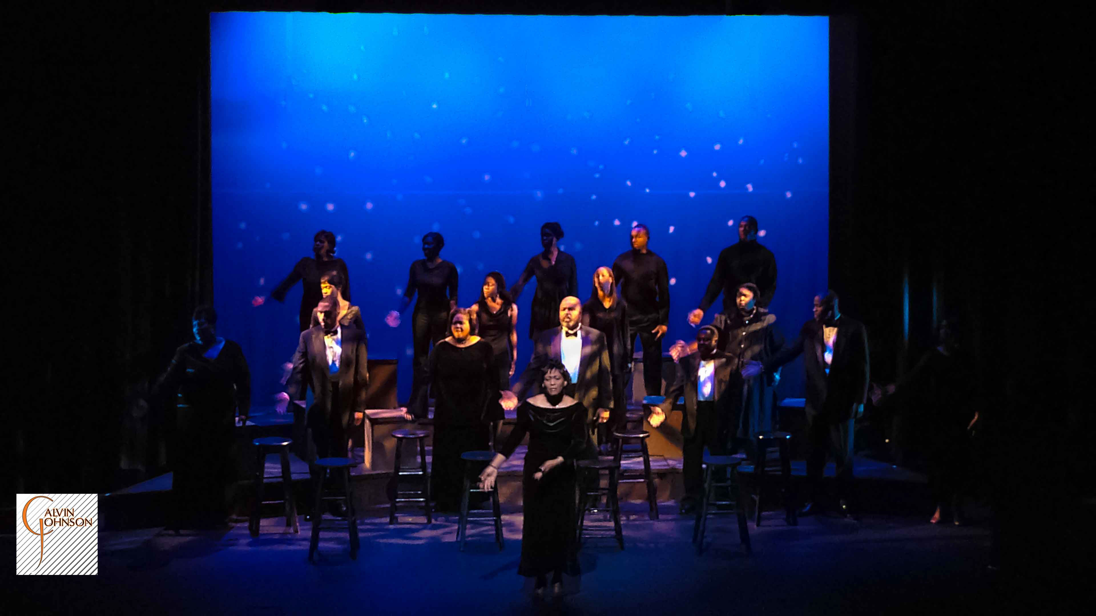 Choral members singing a musical number on stage from The Black Nativity Play.