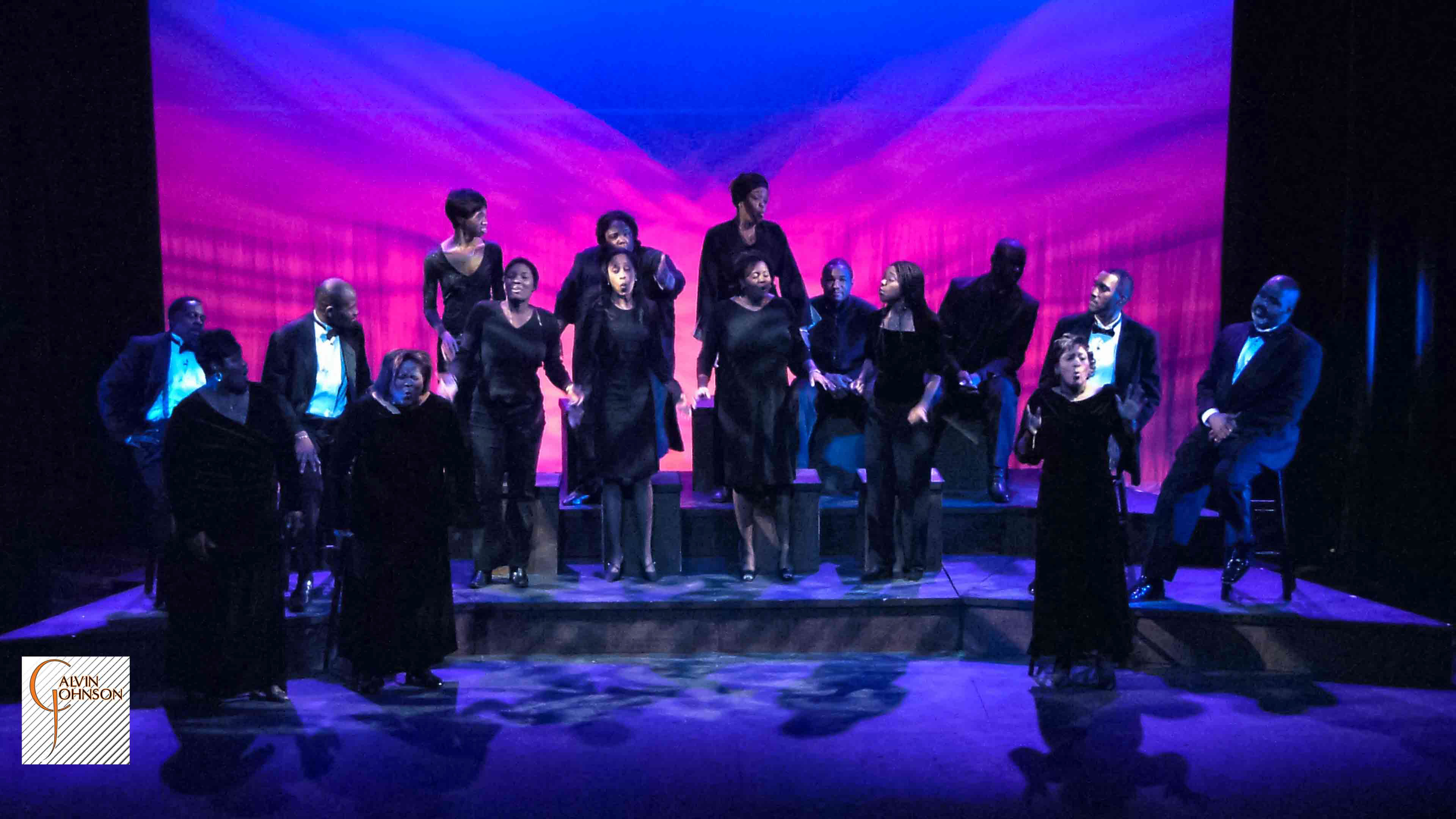 Choral members singing a musical number on stage from The Black Nativity Play.