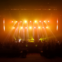 Hip Hop artist B.o.B performing at a concert with DJ Shawty Slim.