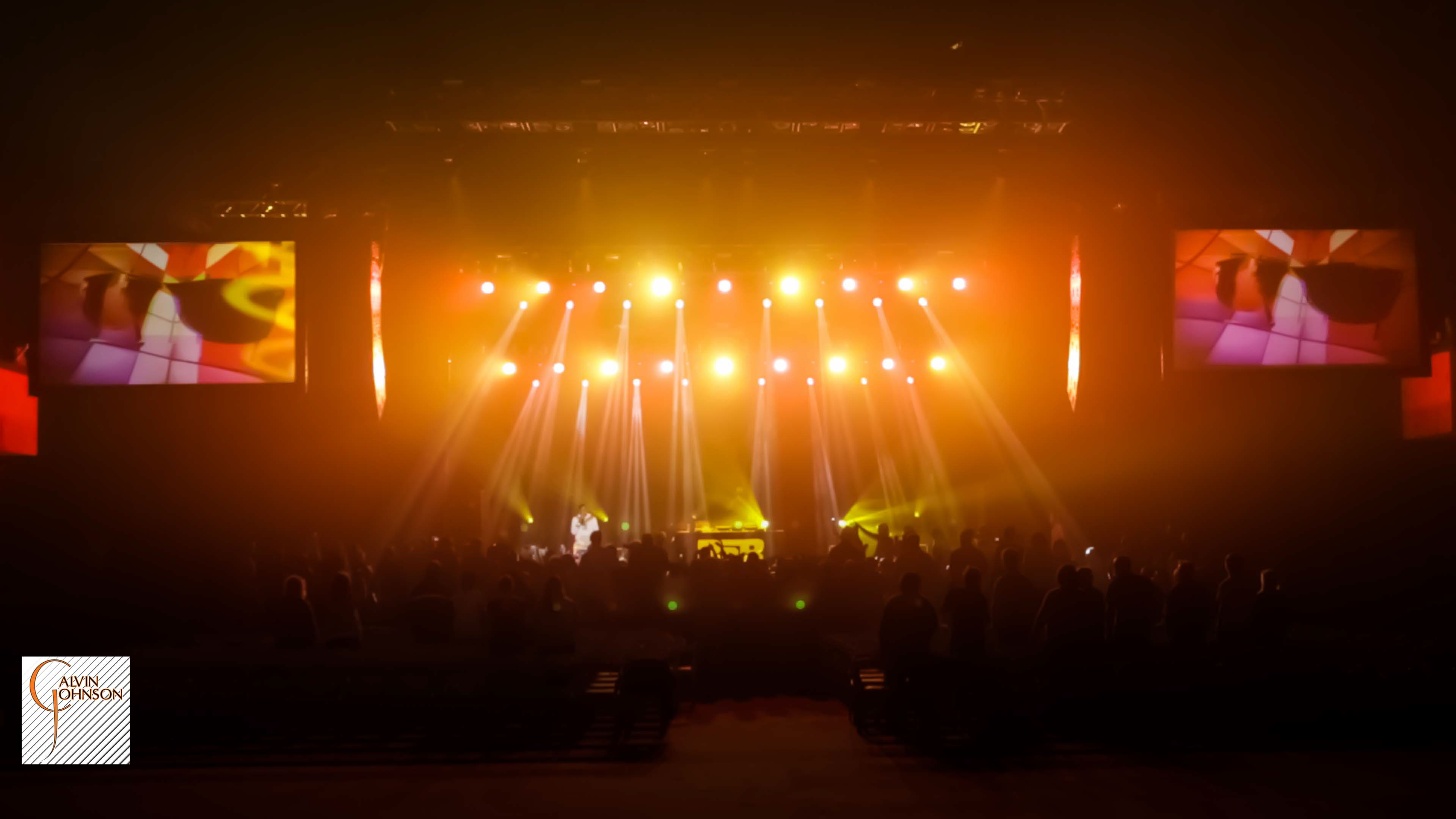 Hip Hop artist B.o.B performing at a concert with DJ Shawty Slim.
