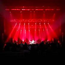 Hip Hop artist B.o.B performing at a concert with DJ Shawty Slim.