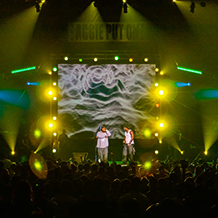 Yellow lighting and smoke surrounding Young Jeezy Concert at North Carolina A&T